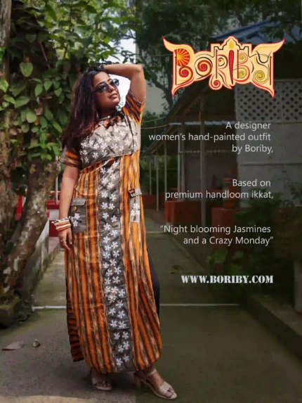 Boriby women’s hand‑painted ikkat kurti with orange and black stripes and floral motif, styled outdoors