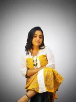 Mustard rayon kurti with embroidery and pleated patchwork front view