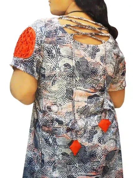Hand‑embroidered printed linen one‑piece dress with pleated sleeves, back view