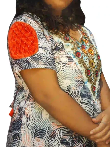 Hand‑embroidered printed linen one‑piece dress with pleated sleeves, sleeve close view