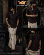 Man wearing Boriby Ajrakh Printed Half Shirt with dhoti and gold border in a heritage setting