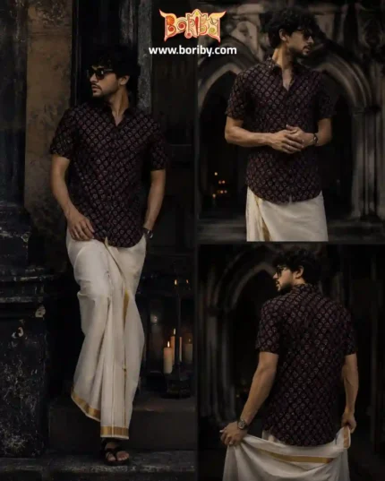 Man wearing Boriby Ajrakh Printed Half Shirt with dhoti and gold border in a heritage setting