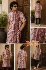 Man wearing handcrafted maroon batik half sleeve cotton kurta with embroidery